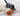 black dog in water with Chuckit! Amphibious Mega Ball Dog Toy, Pet City