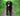 Black dog on a path wearing a Baskerville Ultra Dog Muzzle