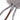 Silvervine Stick Interactive Plush Cat Toy Koala Close-up of a gray fuzzy pom-pom with braided gray cords and a brown stick handle, shown against a white background.