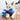 dog playing with Kong Woozles Plush Squeaker Alien Blue Dog Toy