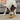 Nylabone Strong Chew Fillable Peanut Dog Treat Toy, Dog playing with Nylabone Strong Chew Fillable Peanut Dog Treat Toy, Pet Essentials Warehouse
