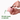 Pink dog toy with a treat being placed into it, held by a hand on a white background. Beco Wobble Ball Dog Toy